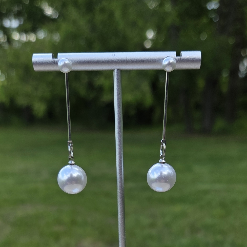 76. Elegant Silver and Pearl Drop Earrings